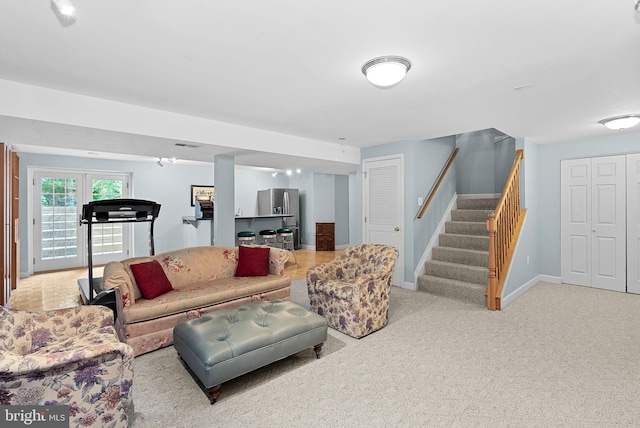 20783 Laplume Pl, Ashburn, VA 20147 - living area with stairway, light carpet, and baseboards