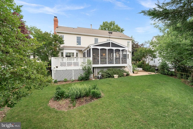 20783 Laplume Pl, Ashburn, VA 20147 - back of house featuring a sunroom, a chimney, and a lawn