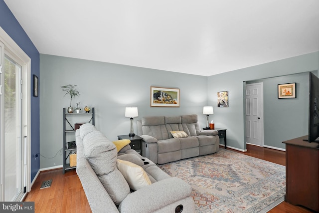 14428 William Carr Ln, Centreville, VA 20120 - living area with baseboards and wood finished floors