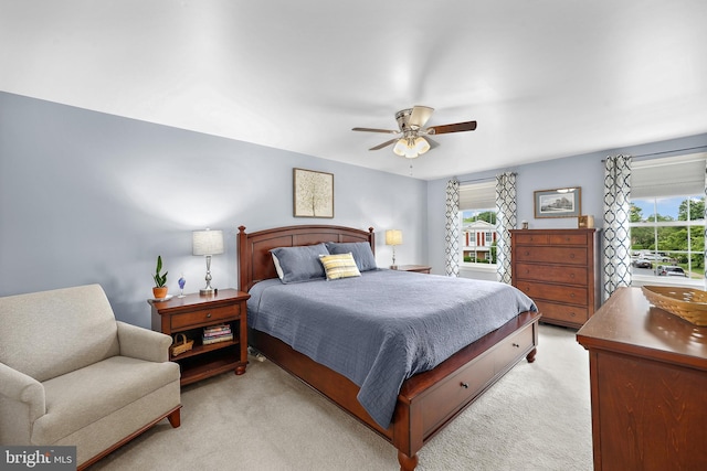 14428 William Carr Ln, Centreville, VA 20120 - bedroom with light carpet and a ceiling fan