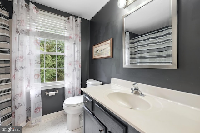 14428 William Carr Ln, Centreville, VA 20120 - full bath featuring vanity, toilet, and tile patterned floors