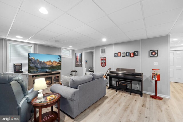 14428 William Carr Ln, Centreville, VA 20120 - living room with light wood-style flooring, a paneled ceiling, and recessed lighting