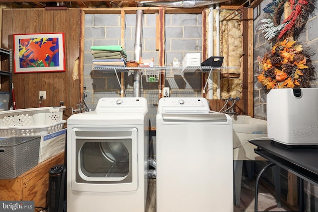 14428 William Carr Ln, Centreville, VA 20120 - washroom featuring washer and clothes dryer and wooden walls