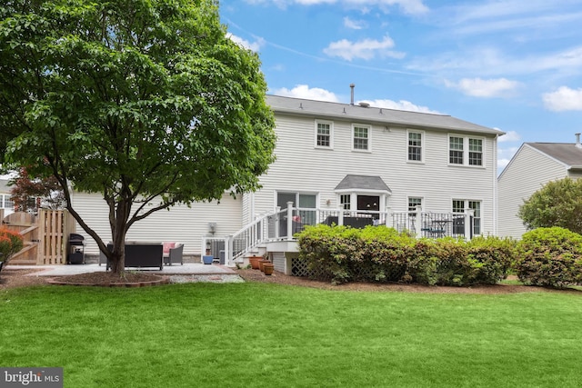 14428 William Carr Ln, Centreville, VA 20120 - rear view of house featuring a patio area and a wooden deck