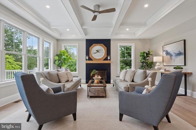 215 S Spring Mill Rd, Villanova, PA 19085 - living room with healthy amount of natural light, a ceiling fan, beamed ceiling, baseboards, and coffered ceiling