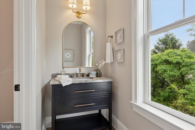 215 S Spring Mill Rd, Villanova, PA 19085 - bathroom with plenty of natural light, vanity, and baseboards
