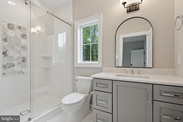 215 S Spring Mill Rd, Villanova, PA 19085 - bathroom featuring vanity, toilet, and a shower stall