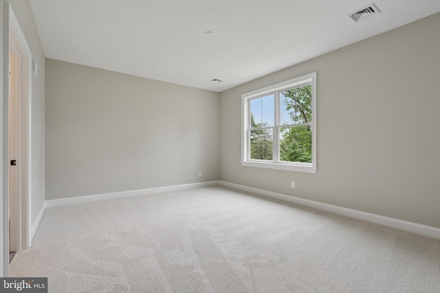 215 S Spring Mill Rd, Villanova, PA 19085 - spare room with baseboards and light carpet
