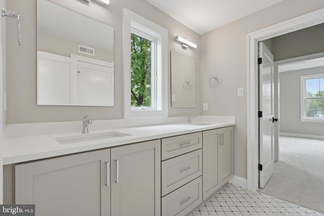 215 S Spring Mill Rd, Villanova, PA 19085 - bathroom with double vanity and baseboards