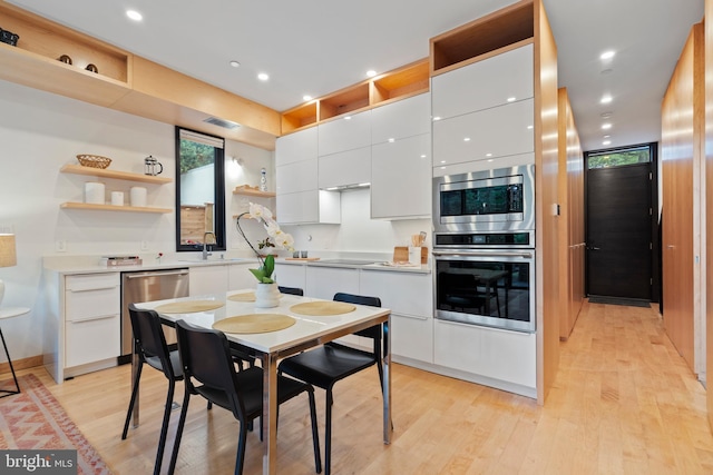 135 13th St NE, Washington, DC 20002 - dining room featuring light wood-style floors and recessed lighting