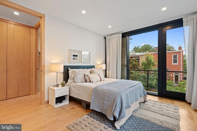 135 13th St NE, Washington, DC 20002 - bedroom with light wood-style floors and recessed lighting