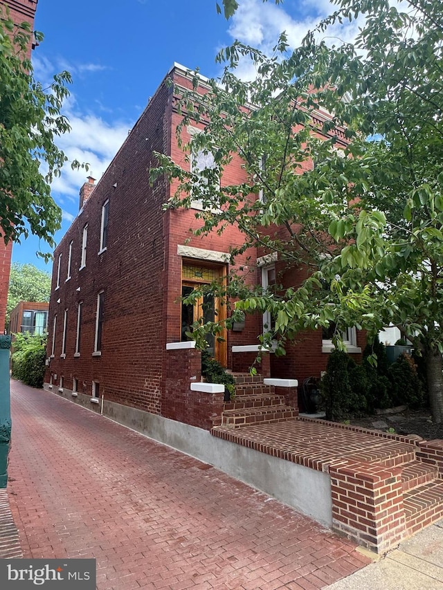 135 13th St NE, Washington, DC 20002 - view of side of home with brick siding