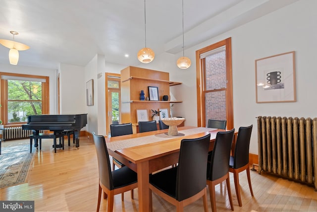 135 13th St NE, Washington, DC 20002 - dining space with radiator and light wood finished floors