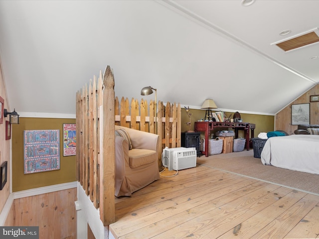 417 S Main St, Berlin, MD 21811 - bedroom with lofted ceiling and hardwood / wood-style flooring