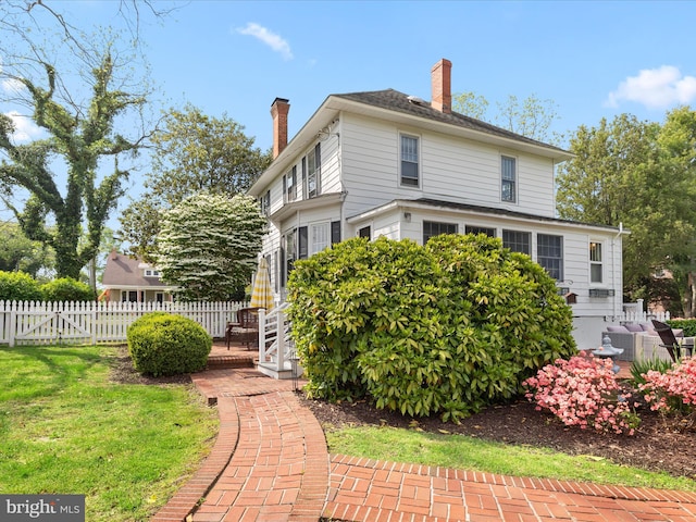 417 S Main St, Berlin, MD 21811 - rear view of house with a chimney