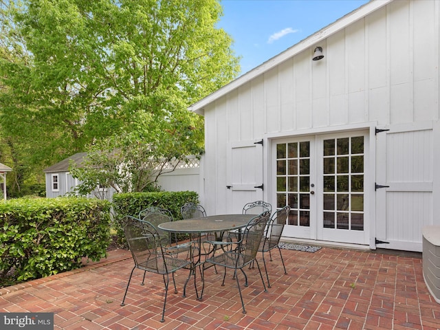 417 S Main St, Berlin, MD 21811 - view of patio featuring french doors and outdoor dining space