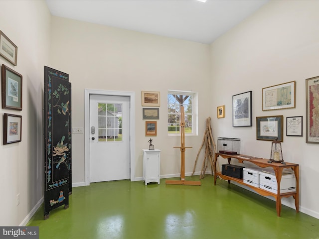 417 S Main St, Berlin, MD 21811 - foyer entrance featuring finished concrete flooring and baseboards