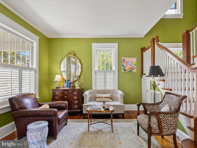 417 S Main St, Berlin, MD 21811 - sitting room with wood finished floors, baseboards, and crown molding