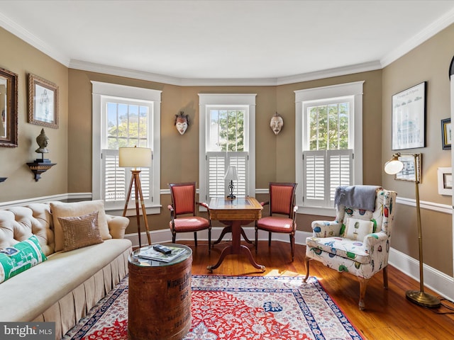 417 S Main St, Berlin, MD 21811 - living area featuring plenty of natural light, wood finished floors, crown molding, and baseboards