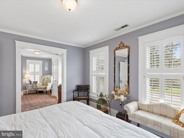 417 S Main St, Berlin, MD 21811 - bedroom with ornamental molding and wood finished floors