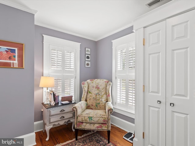417 S Main St, Berlin, MD 21811 - sitting room featuring baseboards, wood finished floors, and ornamental molding