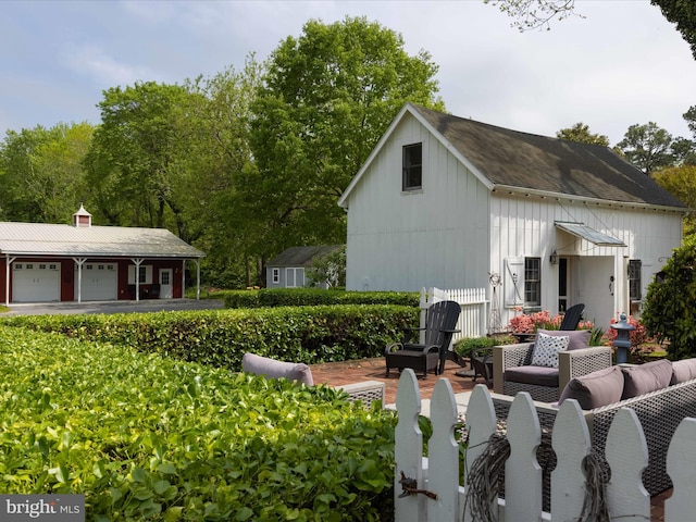 417 S Main St, Berlin, MD 21811 - view of yard with a garage