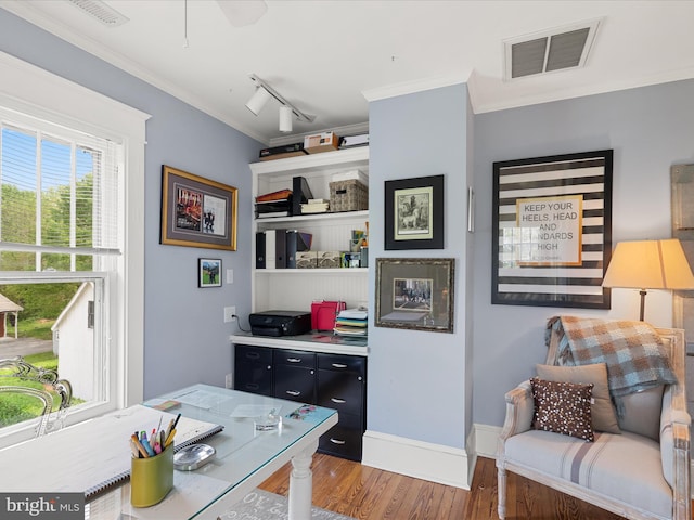 417 S Main St, Berlin, MD 21811 - home office featuring wood finished floors, crown molding, track lighting, baseboards, and a ceiling fan