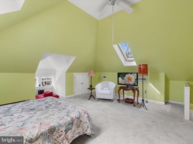 417 S Main St, Berlin, MD 21811 - bedroom with carpet, a skylight, baseboards, ceiling fan, and high vaulted ceiling