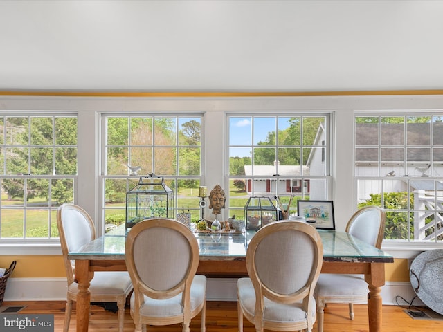 417 S Main St, Berlin, MD 21811 - dining area featuring wood finished floors and baseboards