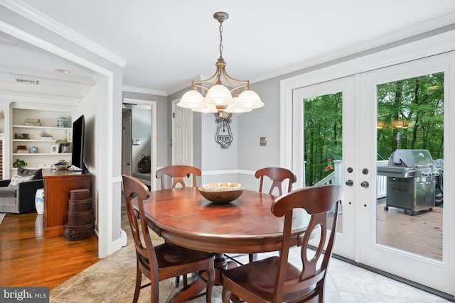 276 Cherry Ln, Doylestown, PA 18901 - dining space featuring french doors, ornamental molding, and a chandelier