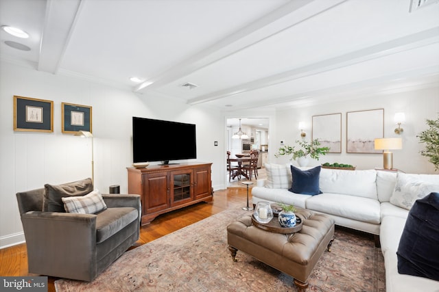 276 Cherry Ln, Doylestown, PA 18901 - living area featuring beam ceiling, wood finished floors, and crown molding