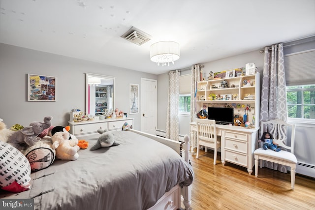 276 Cherry Ln, Doylestown, PA 18901 - bedroom with light wood-style flooring and a desk