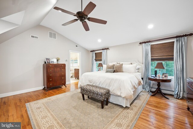 276 Cherry Ln, Doylestown, PA 18901 - bedroom featuring lofted ceiling, light wood-style flooring, baseboard heating, a ceiling fan, and ensuite bathroom