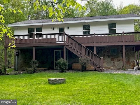 17 Driftwood Ln, Oakland, MD 21550 - rear view of property featuring a wooden deck, a lawn, and stairway