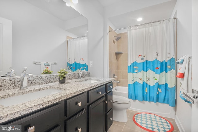 22287 Cornerstone Crossing Ter, Ashburn, VA 20148 - bathroom featuring double vanity, tile patterned flooring, toilet, and shower / bath combination with curtain