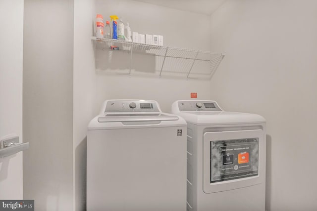 22287 Cornerstone Crossing Ter, Ashburn, VA 20148 - washroom with washer and dryer