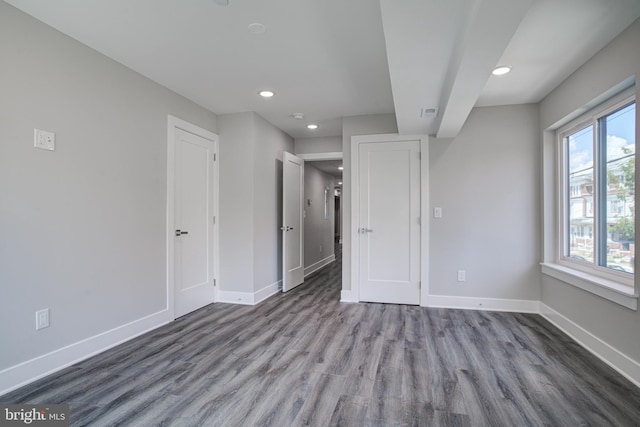 540 S 52nd St, Philadelphia, PA 19143 - unfurnished bedroom featuring baseboards, wood finished floors, and recessed lighting