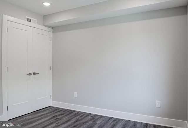 540 S 52nd St, Philadelphia, PA 19143 - unfurnished bedroom featuring a closet, baseboards, dark wood-type flooring, and recessed lighting