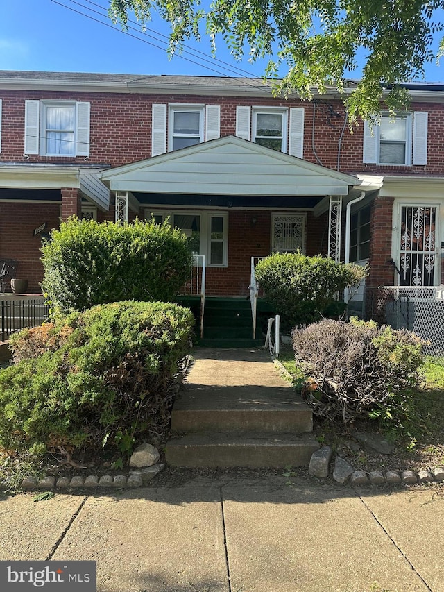 1902 T St SE, Washington, DC 20020 - view of property with a porch and brick siding