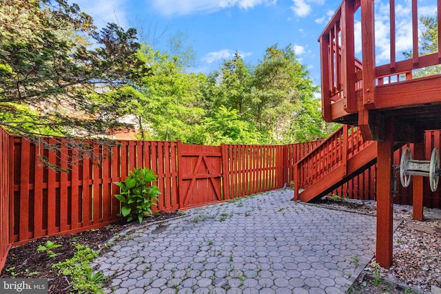 21055 Cornerpost Sq, Ashburn, VA 20147 - fenced backyard with a patio area and stairway