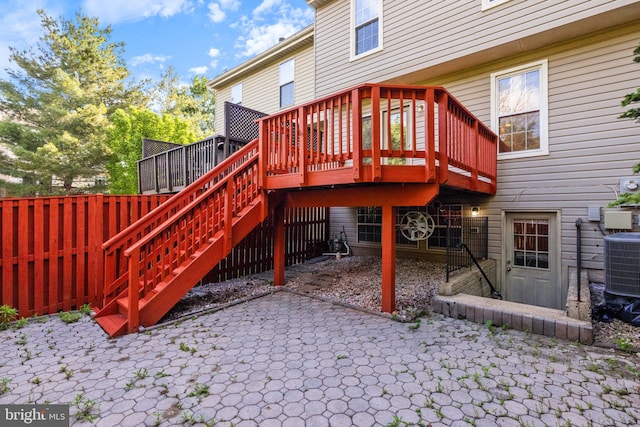 21055 Cornerpost Sq, Ashburn, VA 20147 - back of property with a patio, central air condition unit, a deck, and stairway