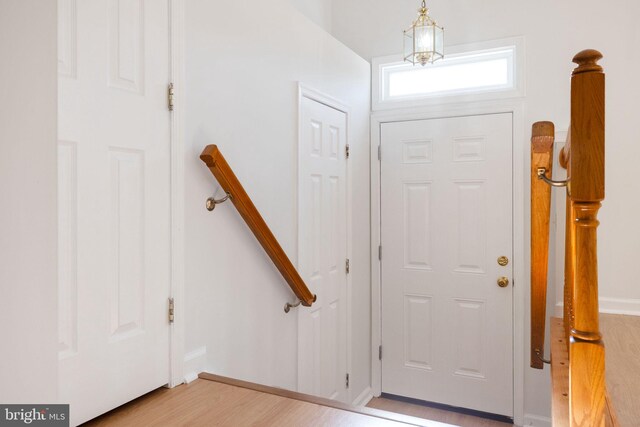 21055 Cornerpost Sq, Ashburn, VA 20147 - entrance foyer featuring light wood-style flooring and baseboards