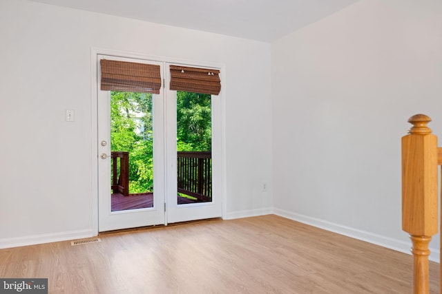 21055 Cornerpost Sq, Ashburn, VA 20147 - unfurnished room with wood finished floors and baseboards