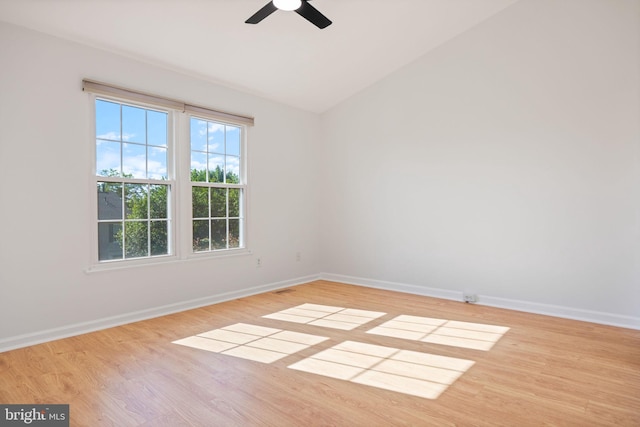 21055 Cornerpost Sq, Ashburn, VA 20147 - spare room with lofted ceiling, wood finished floors, ceiling fan, and baseboards