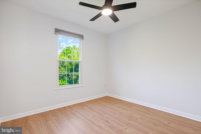21055 Cornerpost Sq, Ashburn, VA 20147 - unfurnished room with light wood finished floors, baseboards, and ceiling fan