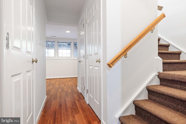 21055 Cornerpost Sq, Ashburn, VA 20147 - staircase featuring wood finished floors, recessed lighting, and baseboards