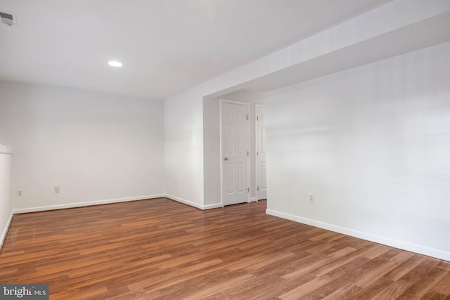 21055 Cornerpost Sq, Ashburn, VA 20147 - unfurnished room featuring wood finished floors, baseboards, and recessed lighting