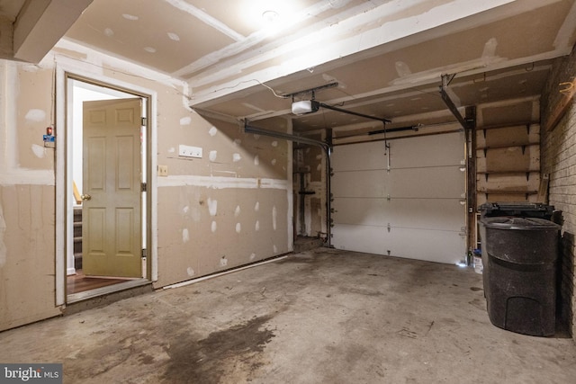 21055 Cornerpost Sq, Ashburn, VA 20147 - garage featuring a garage door opener