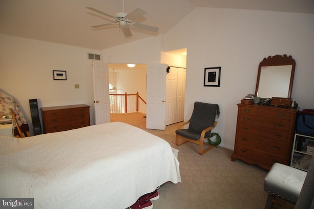 319 Fieldstone Dr, New Hope, PA 18938 - bedroom with light colored carpet, vaulted ceiling, a closet, and ceiling fan