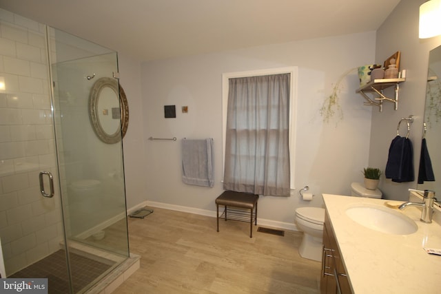 319 Fieldstone Dr, New Hope, PA 18938 - full bath featuring toilet, wood finished floors, a shower stall, vanity, and baseboards